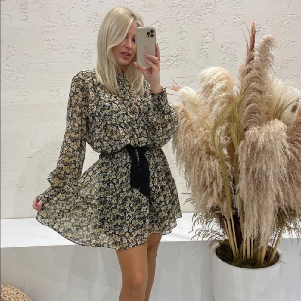 Long sleeve floral mini dress comes in S, M, and L